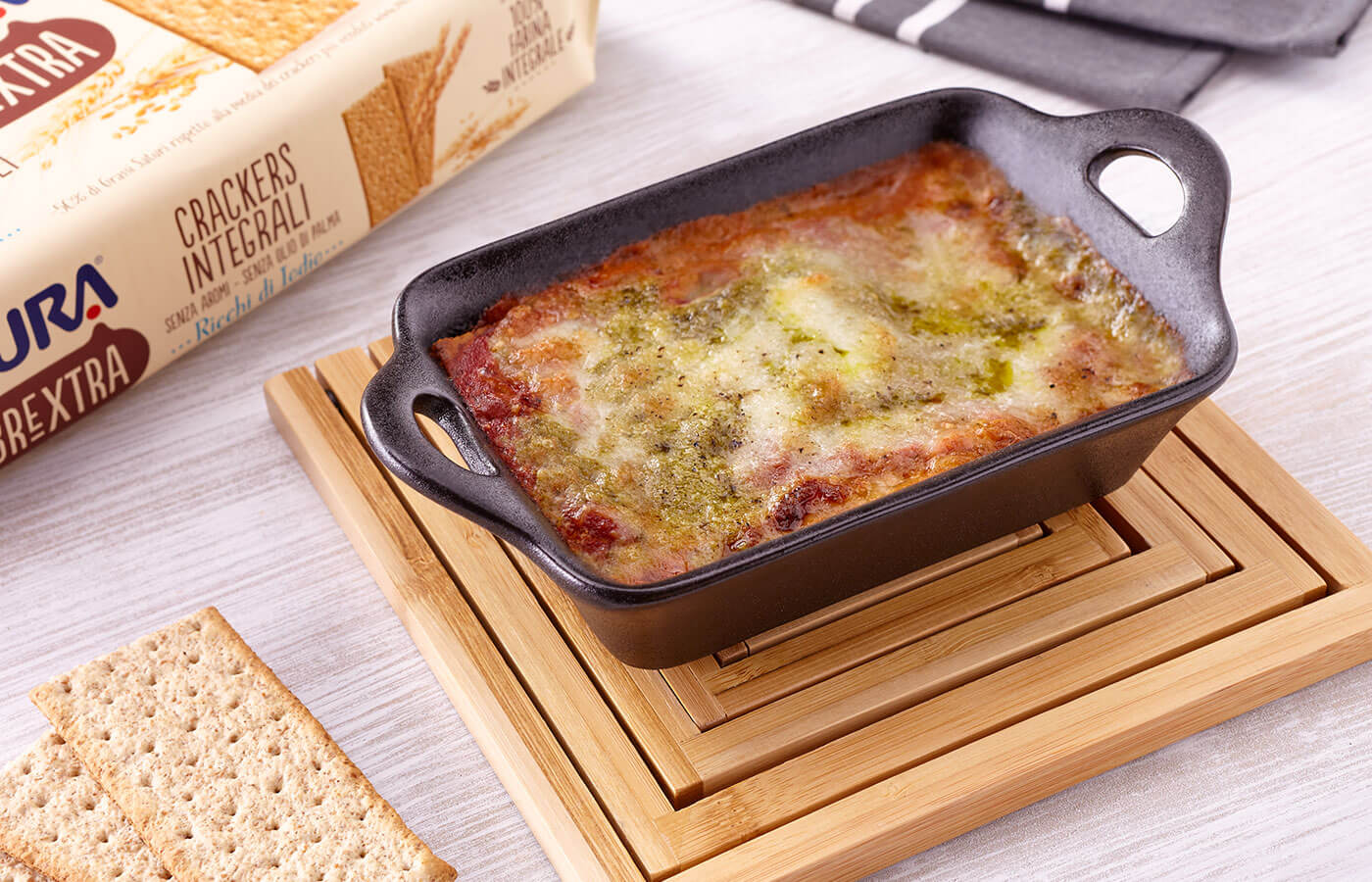 Lasagna con crackers integrali Fibrextra e pesto alla genovese